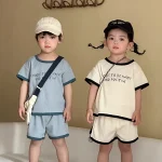 【80-150cm】セットアップ 半袖Ｔシャツ＆ショートパンツ 英字柄 - 画像 (4)